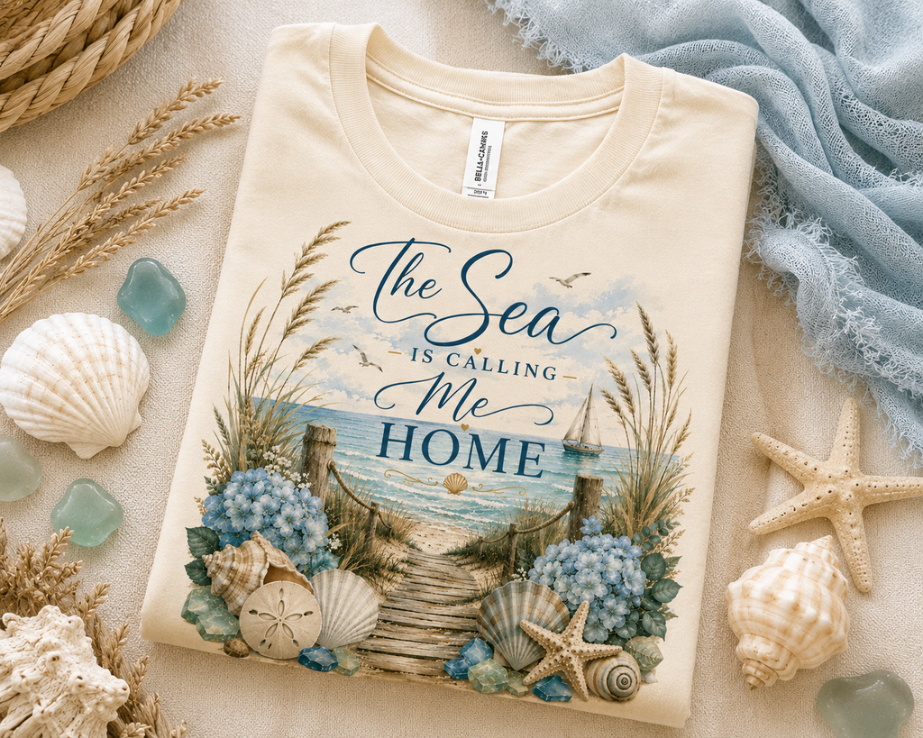 The Sea Is Calling Me Home Coastal Luxe Tee folded detail view