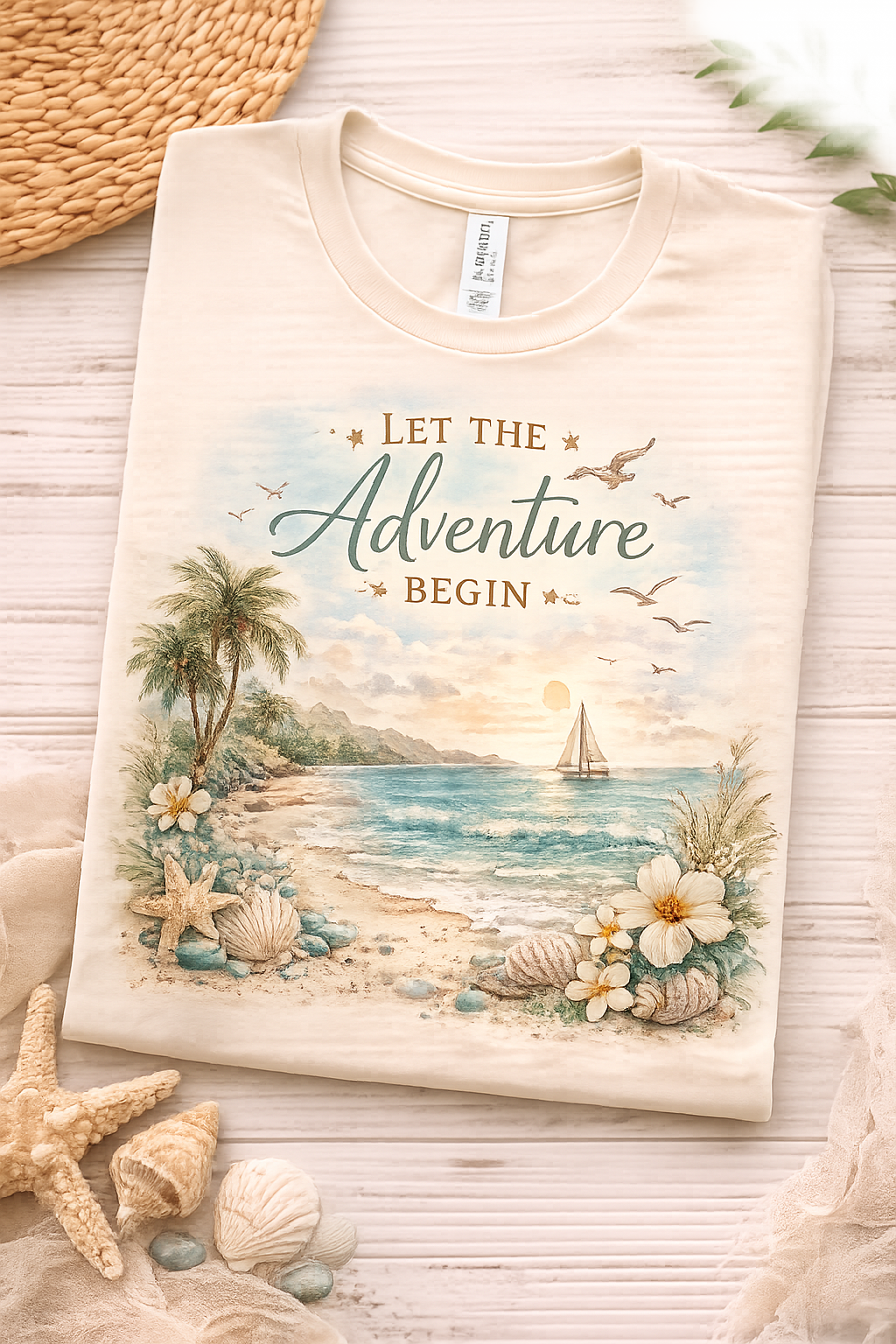 Let the Adventure Begin Coastal Luxe Tee folded detail view
