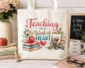 Teaching Is a Work of Heart teacher tote bag